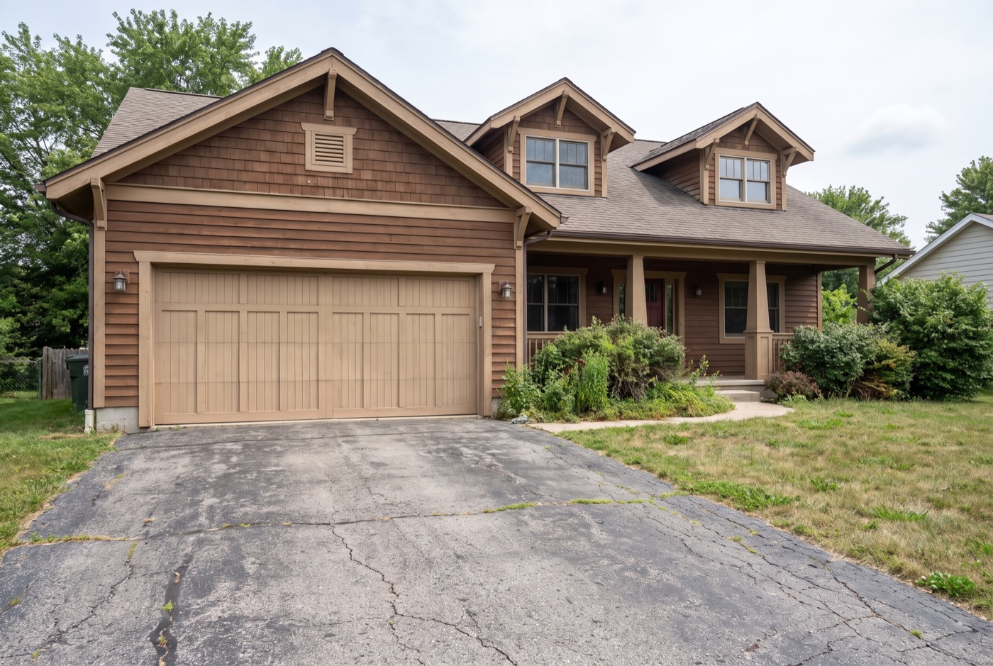 Straight-on: flat, garage-dominant